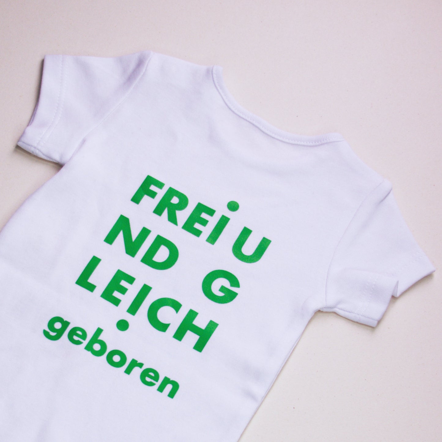 Baby-Body "Frei und Gleich geboren" aus Bio-Bauwolle